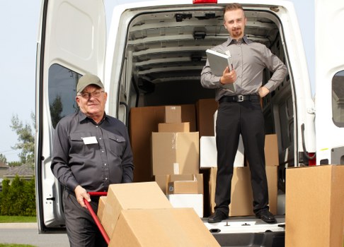 Careful loading of boxes and furniture from a London house