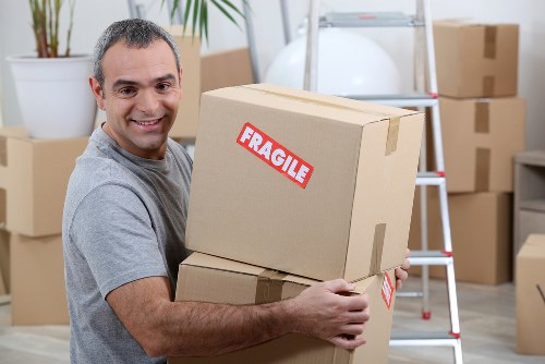 Removal team planning a move in a London street