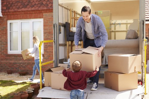Packed boxes and furniture ready for a local removals service in London