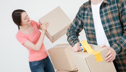 Commercial office relocation with labelled boxes and desks