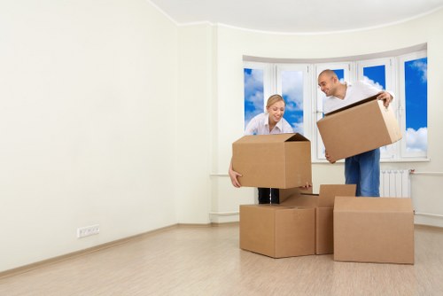 Mover reviewing a complaint report with documents and inventory notes