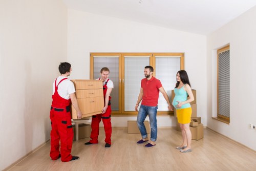 Mover helping with a flat relocation in London
