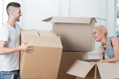 Loading furniture into a van for a city collection